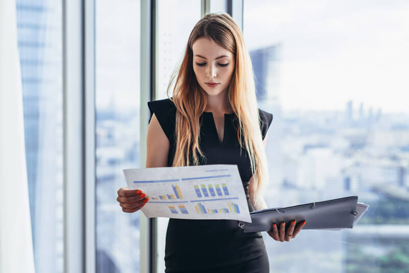 female business woman reading reports