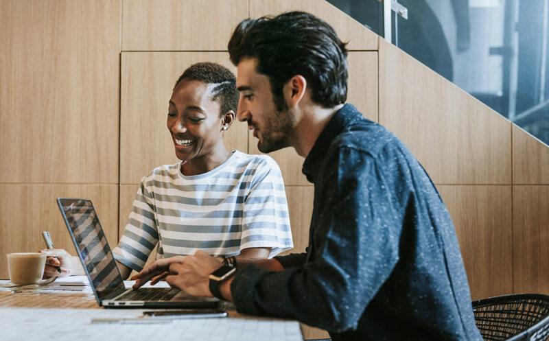 male and female coworkers working together